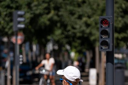 cyclists riding in a protected bike lane