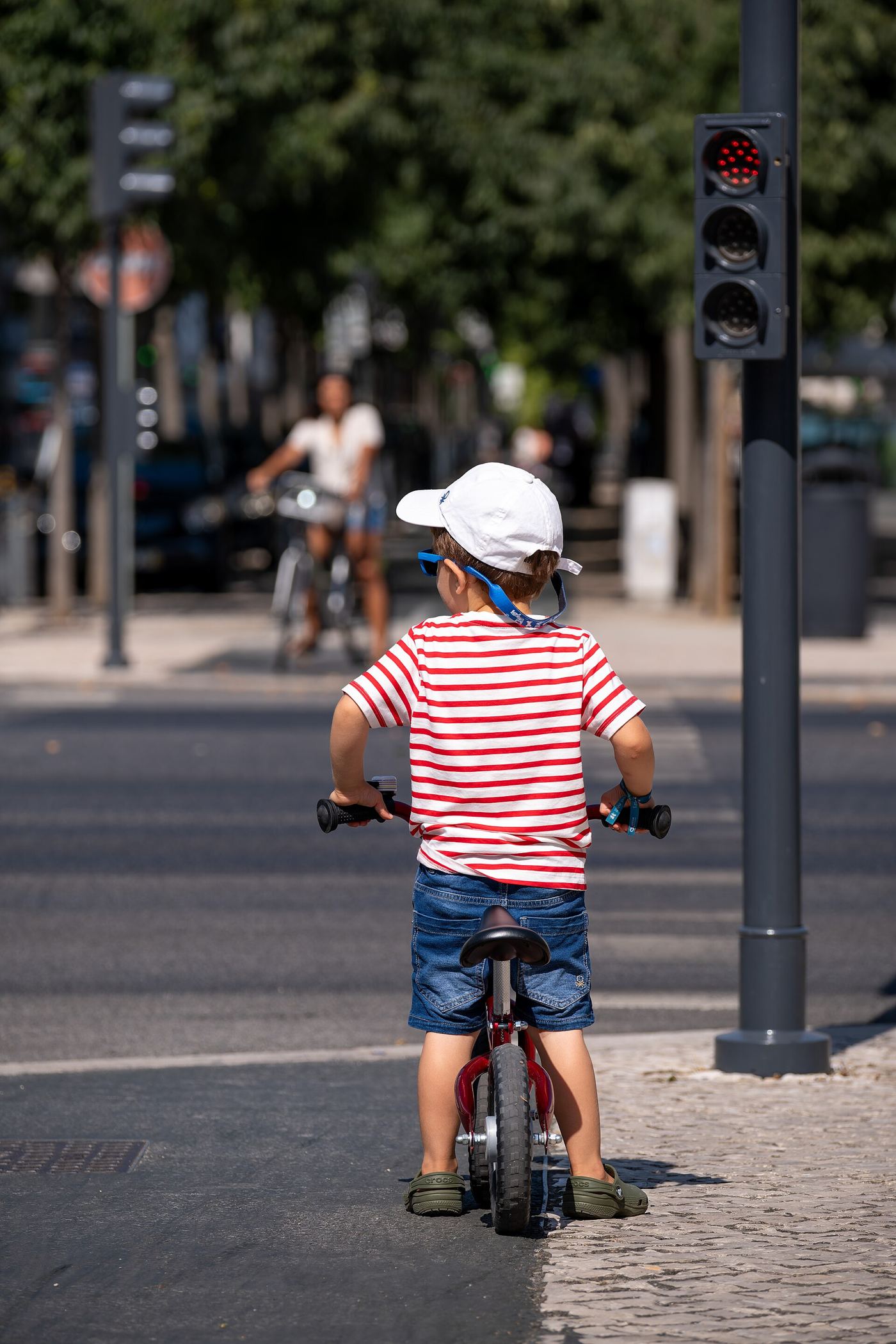 cyclists riding in a protected bike lane