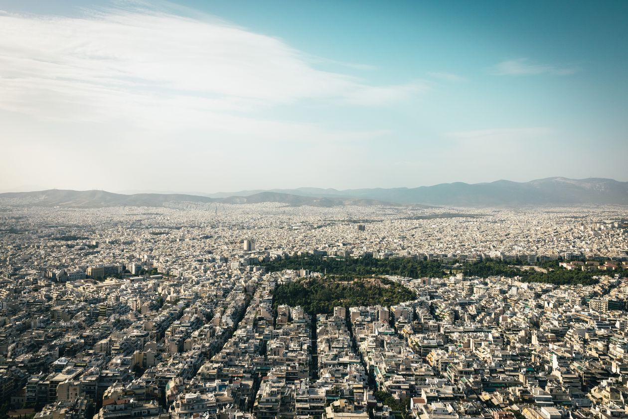 A panoramic view over Athens towards distant mountains