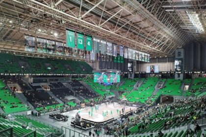 A packed basketball arena during an NBA game